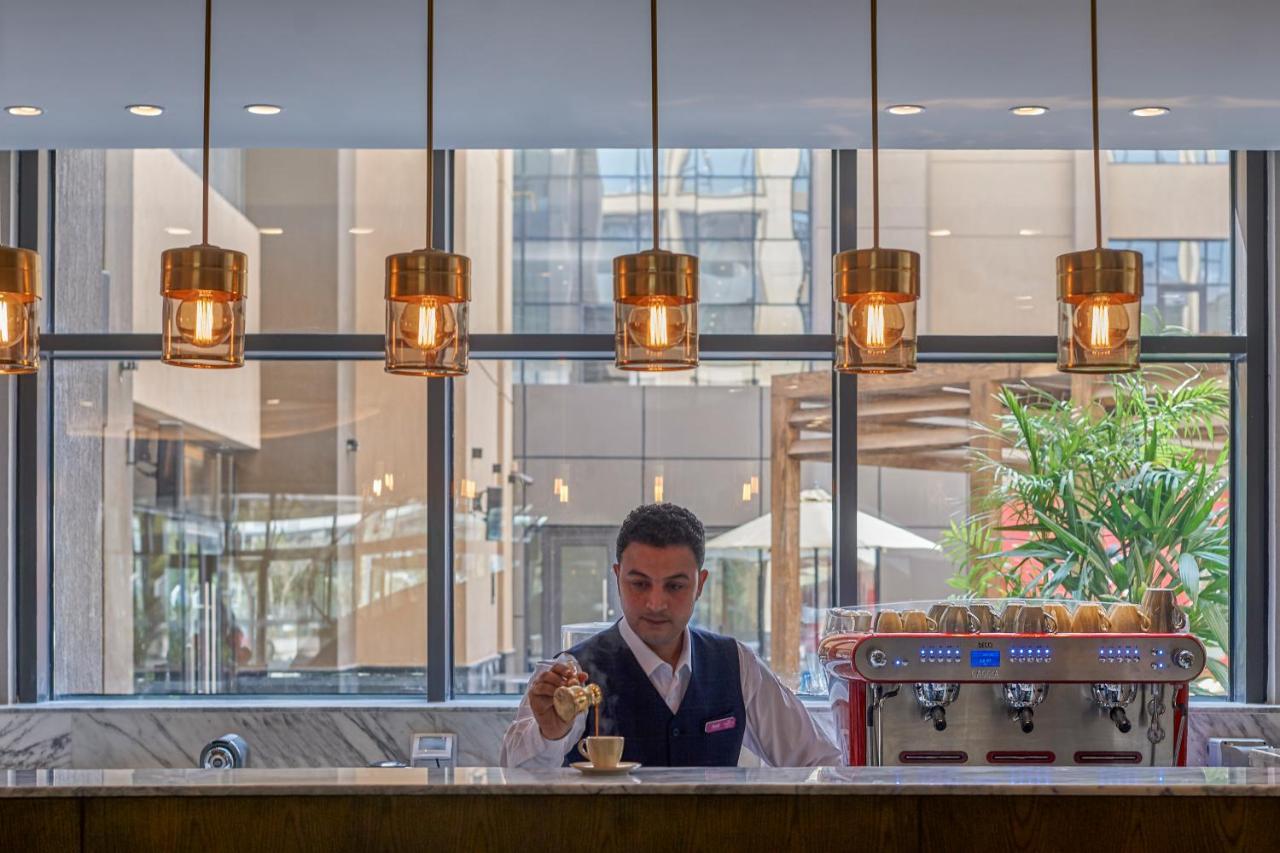 Crowne Plaza - West Cairo Arkan By Ihg 6th of October City Екстериор снимка Barista at work
